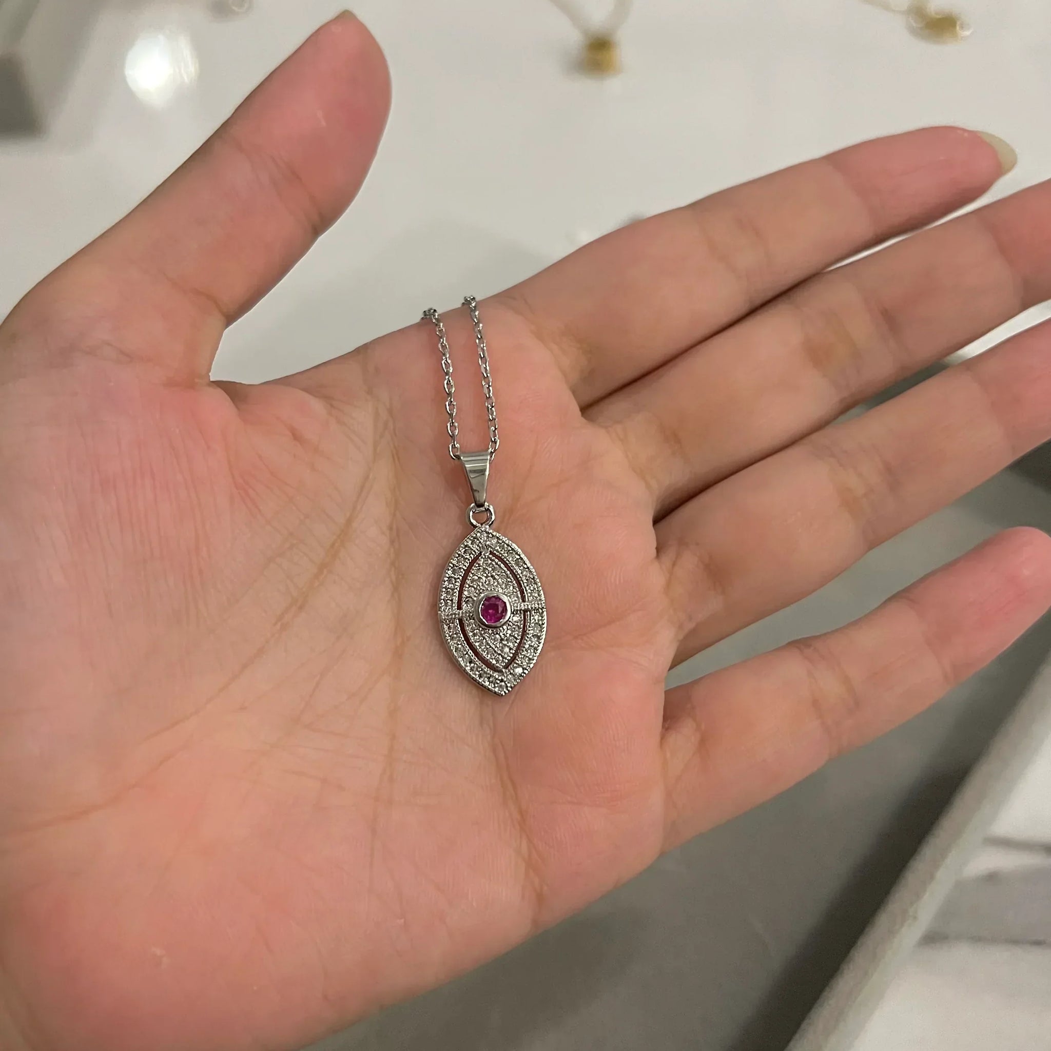 Evil eye silver rhinestone necklace